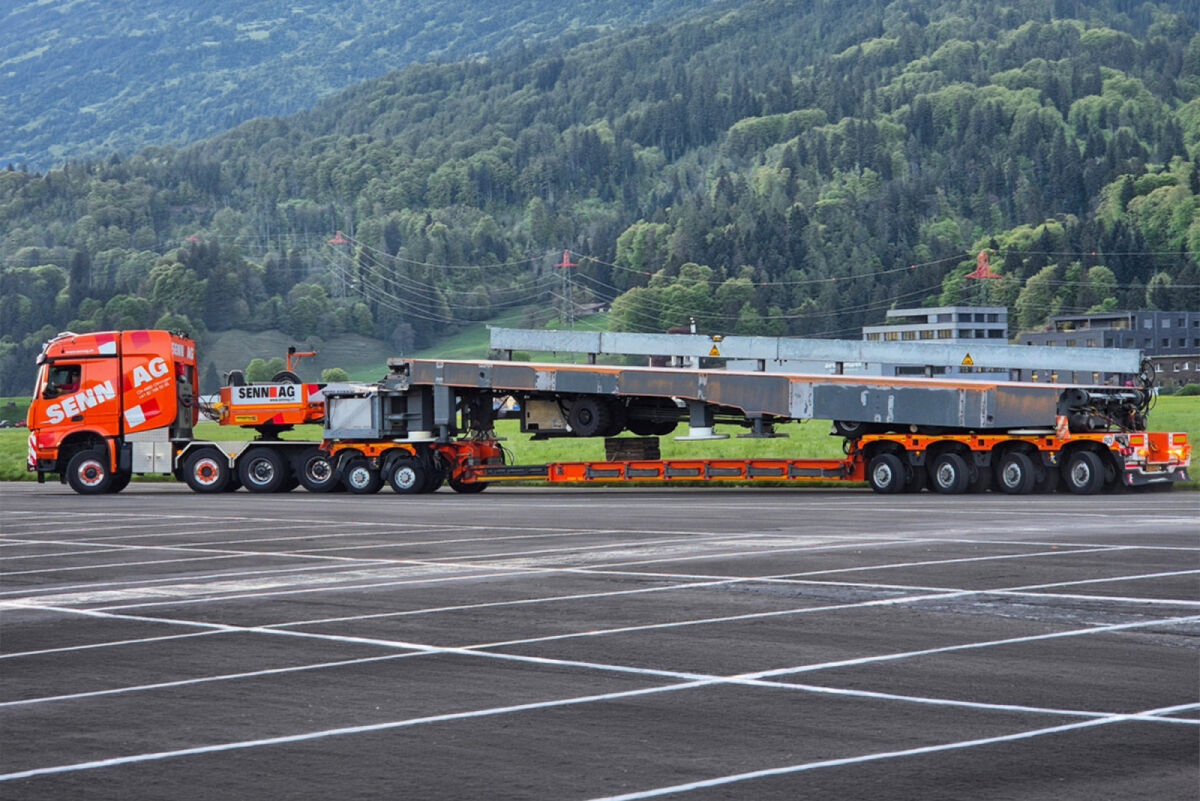 01-5430 -WSI - Mercedes Benz Arocs  MP4 2.300MM Stream Space 8X6 Tieflader mit Dolly 2-achs - 4-achs " Senn AG" CH